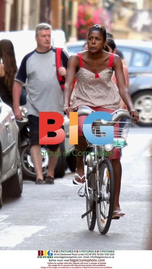 Marie-Jo Perec and boyfriend bike in Paris
