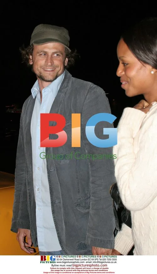 Kerry Washington and David Moscow Entering Taxi