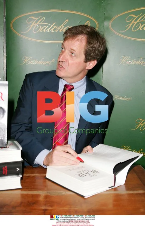 Alistair Campbell signs "The Blair Years" book
