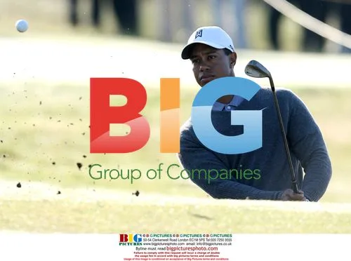 Tiger Woods plays out of bunker at Open