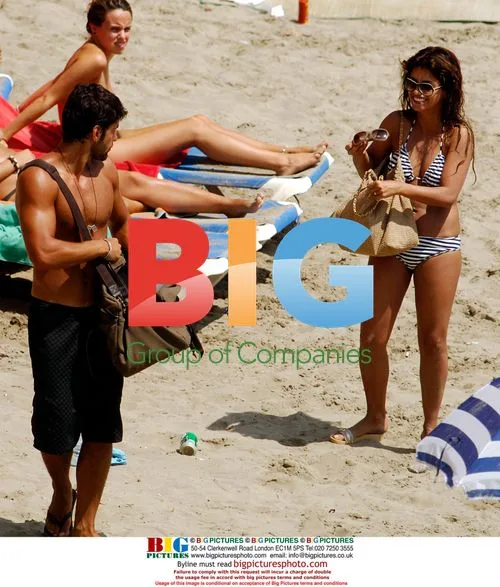 Monica Cruz at the beach with family