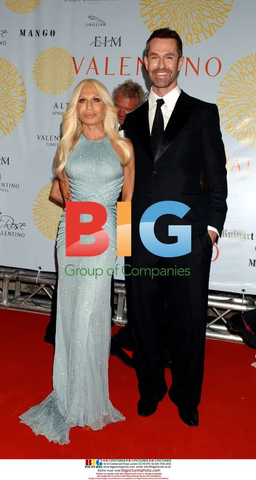 Donatella Versace and Rupert Everett at Valentino event