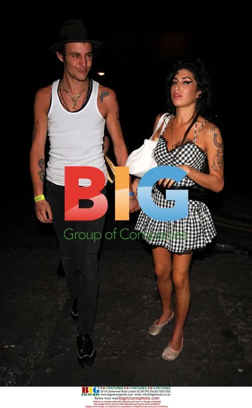 Amy Winehouse and husband at clubs in London