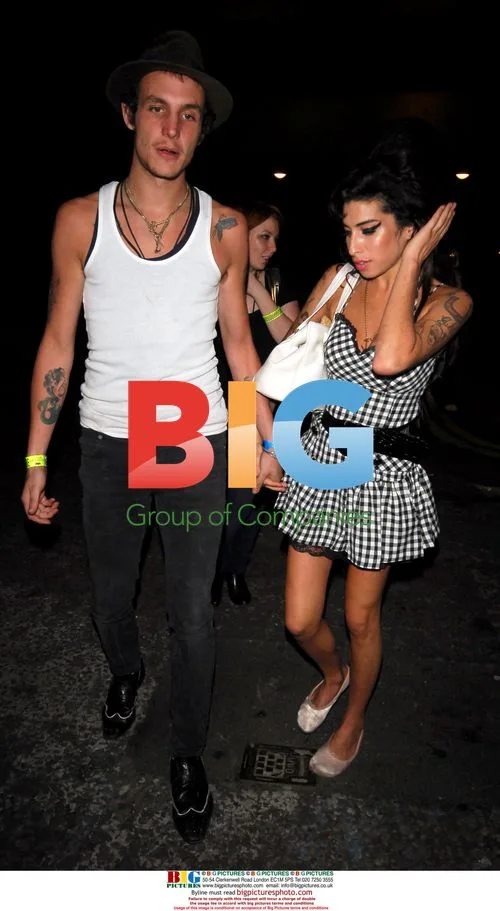 Amy Winehouse and husband Blake at London club