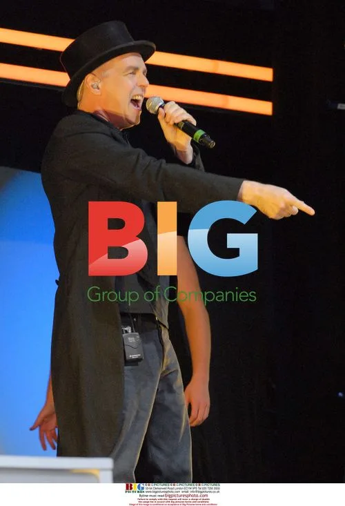 Neil Tennant of Pet Shop Boys performs live