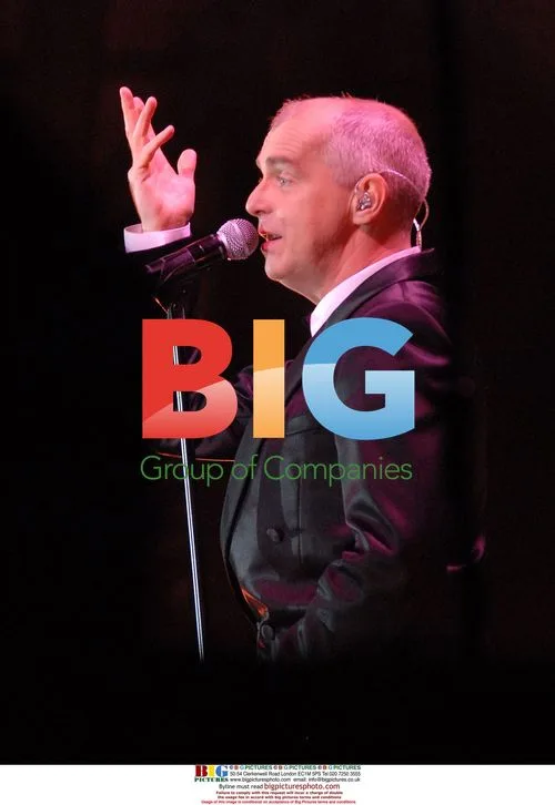 Singer Neil Tennant of Pet Shop Boys performs live