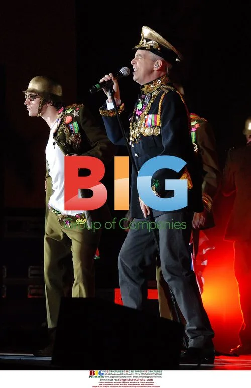 Neil Tennant of Pet Shop Boys performs live
