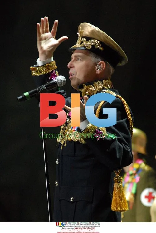Neil Tennant of Pet Shop Boys performs live