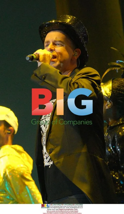Neil Tennant of Pet Shop Boys performs live