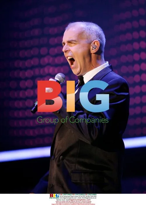 Neil Tennant of Pet Shop Boys performs live