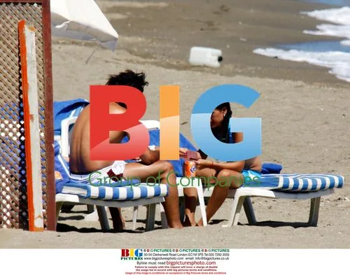 Tevez on holiday with family in Spain