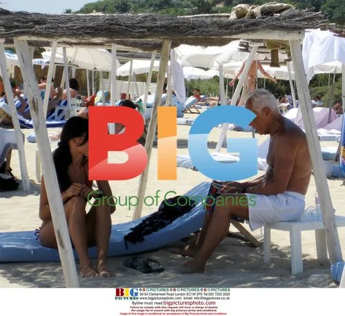Giorgio Armani Relaxing on Beach in St. Tropez