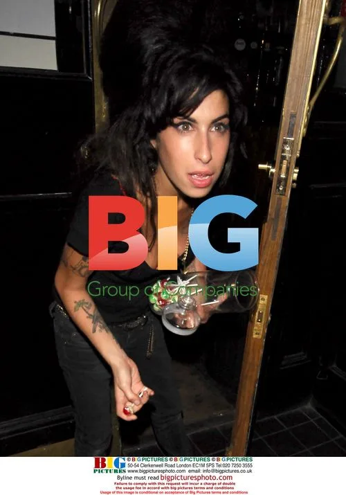 Amy Winehouse Leaves ICA Gig for Pub