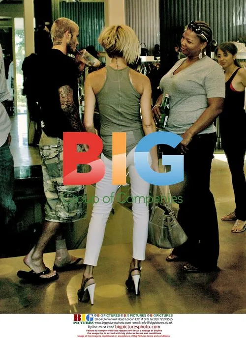 Victoria & David Beckham Shop with Queen Latifah