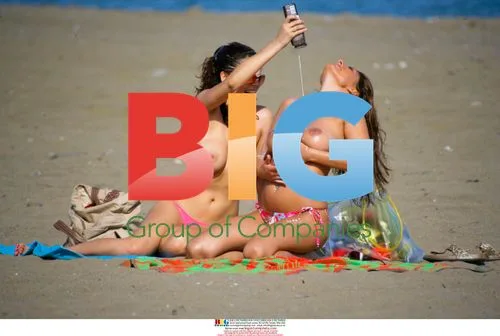 Glamour models enjoy beach in Spain