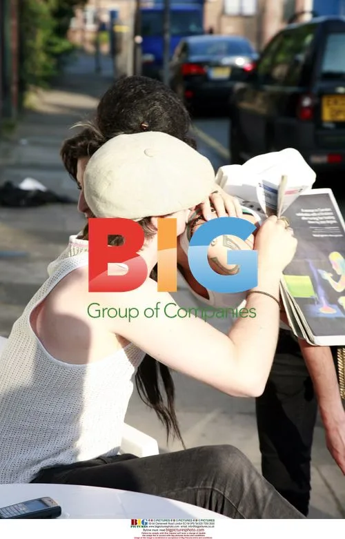 Amy Winehouse Seen Smoking in London