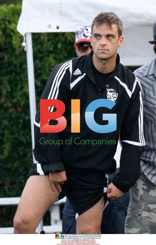 Robbie Williams Spectates Soccer Match