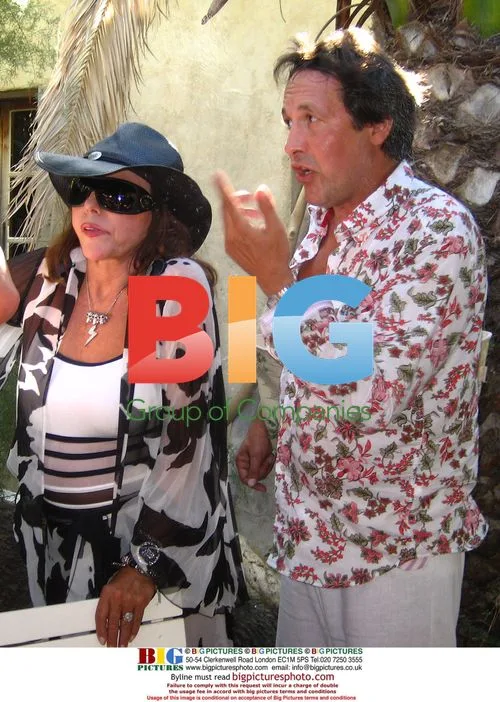 Joan Collins and Ron Kass at Club 55