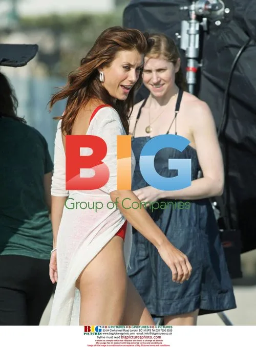 Kate Walsh heats up Malibu beach in swim suits