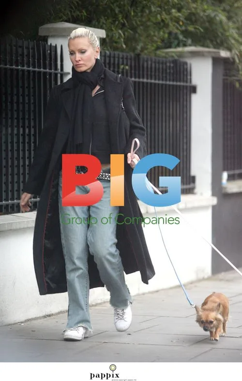 Caprice Bourret walks dogs in London