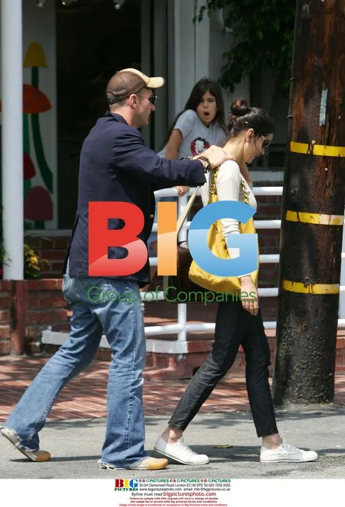 Teri Hatcher and Stephen Kay Embrace in Car Park