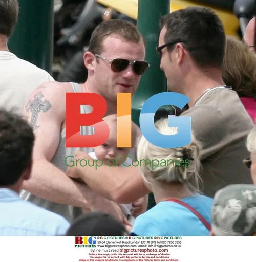 Coleen McLoughlin and Wayne Rooney in France