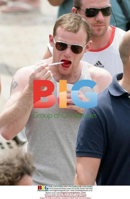 Coleen McLoughlin and Wayne Rooney in France
