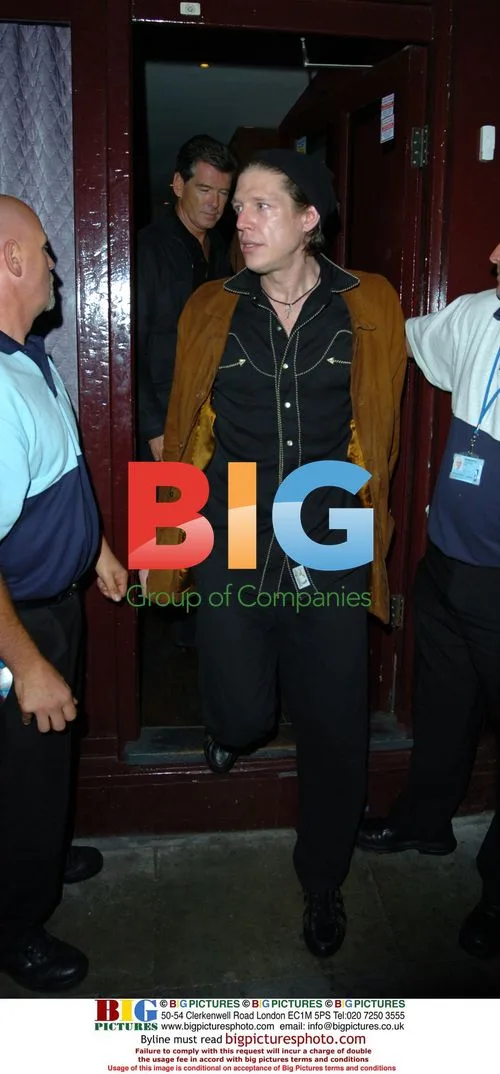 Pierce Brosnan and son leaving Paul McCartney gig