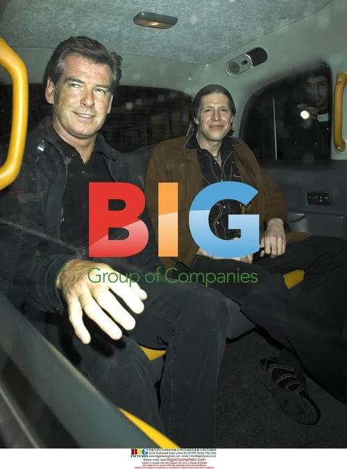 Pierce Brosnan and Chris Brosnan at Paul McCartney's gig