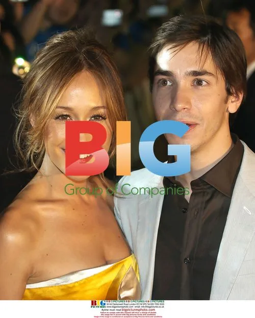 Justin Long and Maggie Q. at "Live Free or Die Hard" premiere