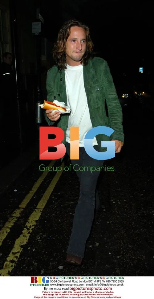 Ben Mills Eating Hot Dog at Chinawhites