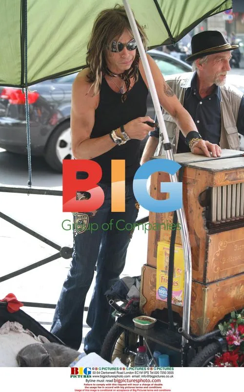 Steven Tyler Goes Shopping in Paris