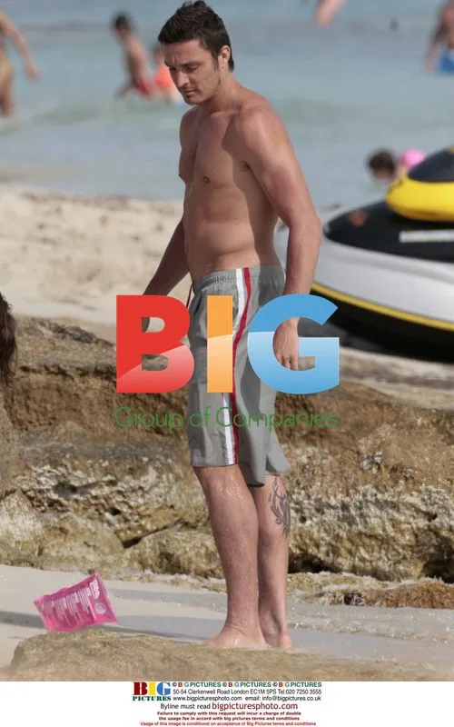 Massimo Oddo with family on beach