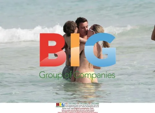 Massimo Oddo with family on beach