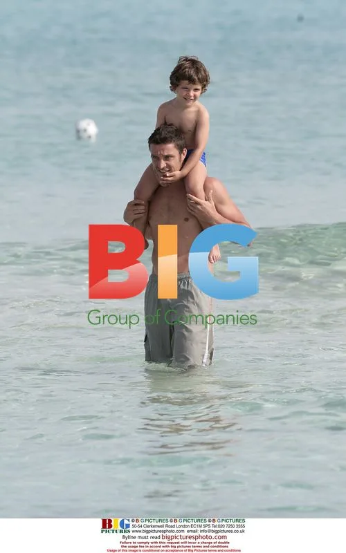 Massimo Oddo with family on beach