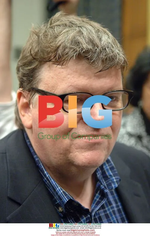 Michael Moore Speaks to Reporters
