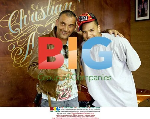 Chris Brown shops at Ed Hardy