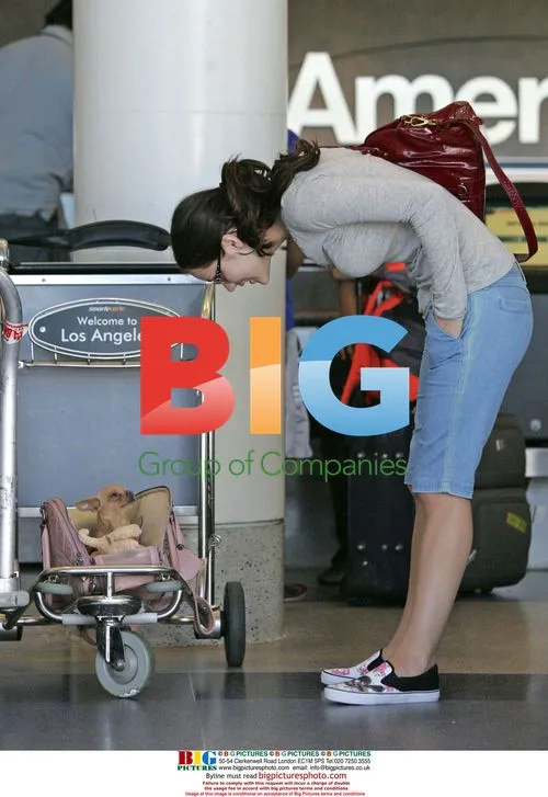 Katherine McPhee and boyfriend at LAX