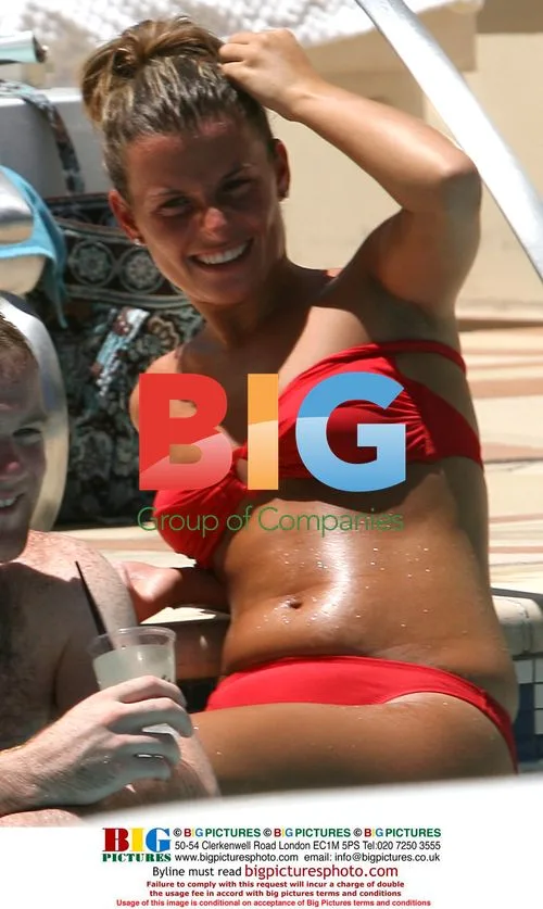 Wayne Rooney and Coleen at Wynn Hotel pool