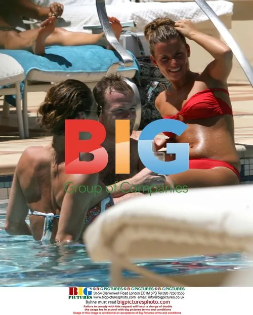 Wayne Rooney and Coleen at Wynn Hotel pool