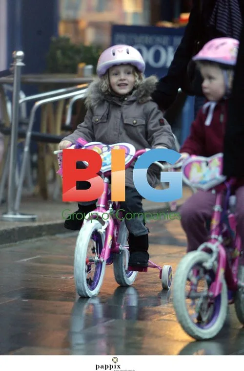 Misty Kyd riding bike in North London