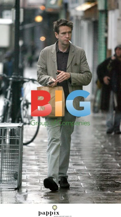 Oliver Peyton smoking in London