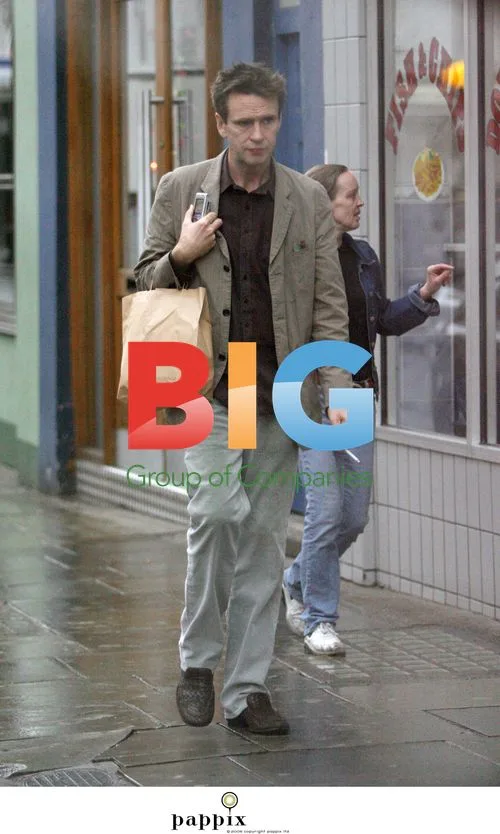 Oliver Peyton smoking a cigarette in London