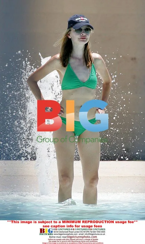 Calista Flockhart and son Liam visit pool