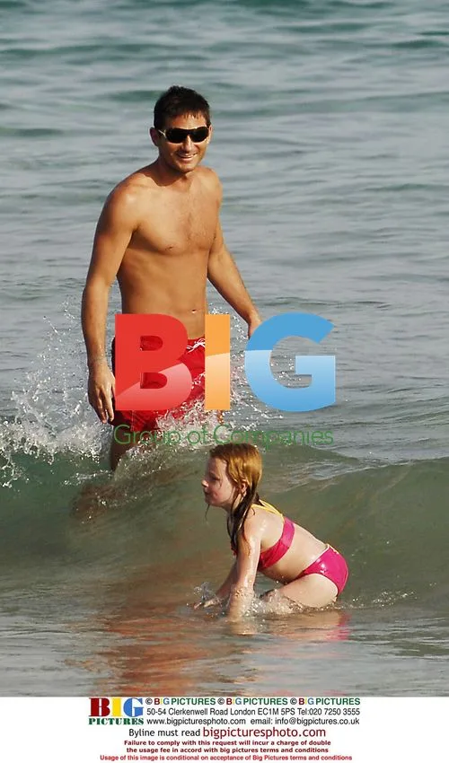Frank Lampard and family on beach in Spain