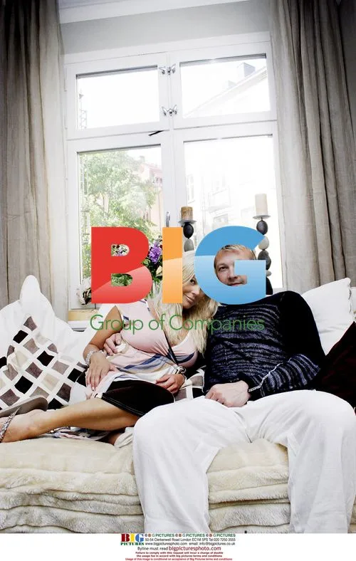 Swedish footballer Magnus Hedman and wife at home
