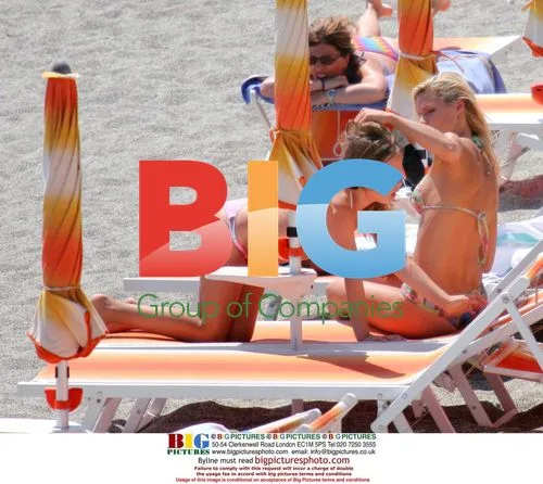 Michelle Hunziker and Aurora on Beach Holiday