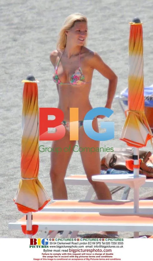 Michelle Hunziker and daughter enjoy beach holiday