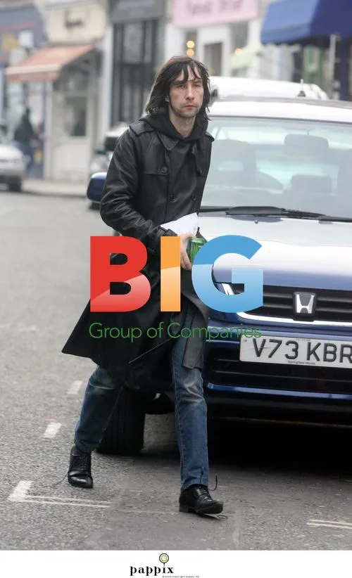 Singer Bobby Gillespy looks tired in North London