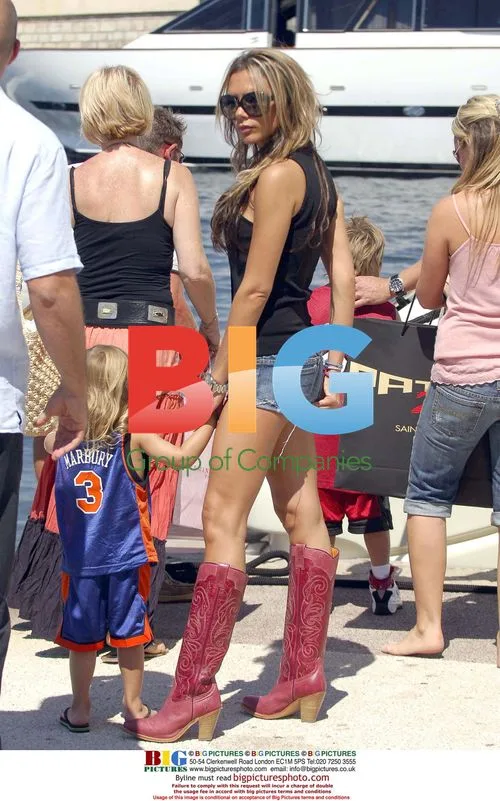 Victoria Beckham with sons Romeo and Brooklyn